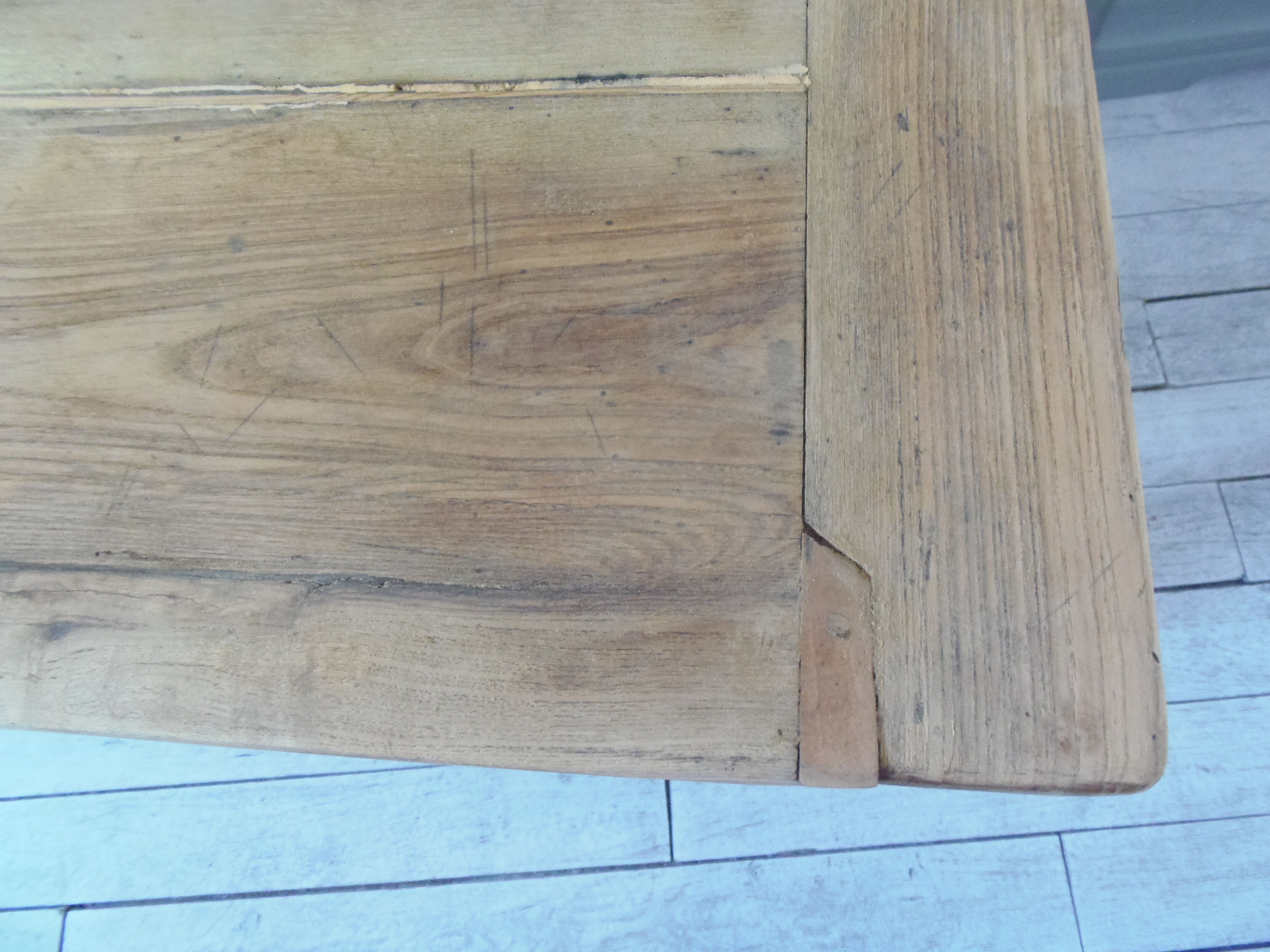 Coffee table made from an authentic farmhouse table, leg patinated pearl gray