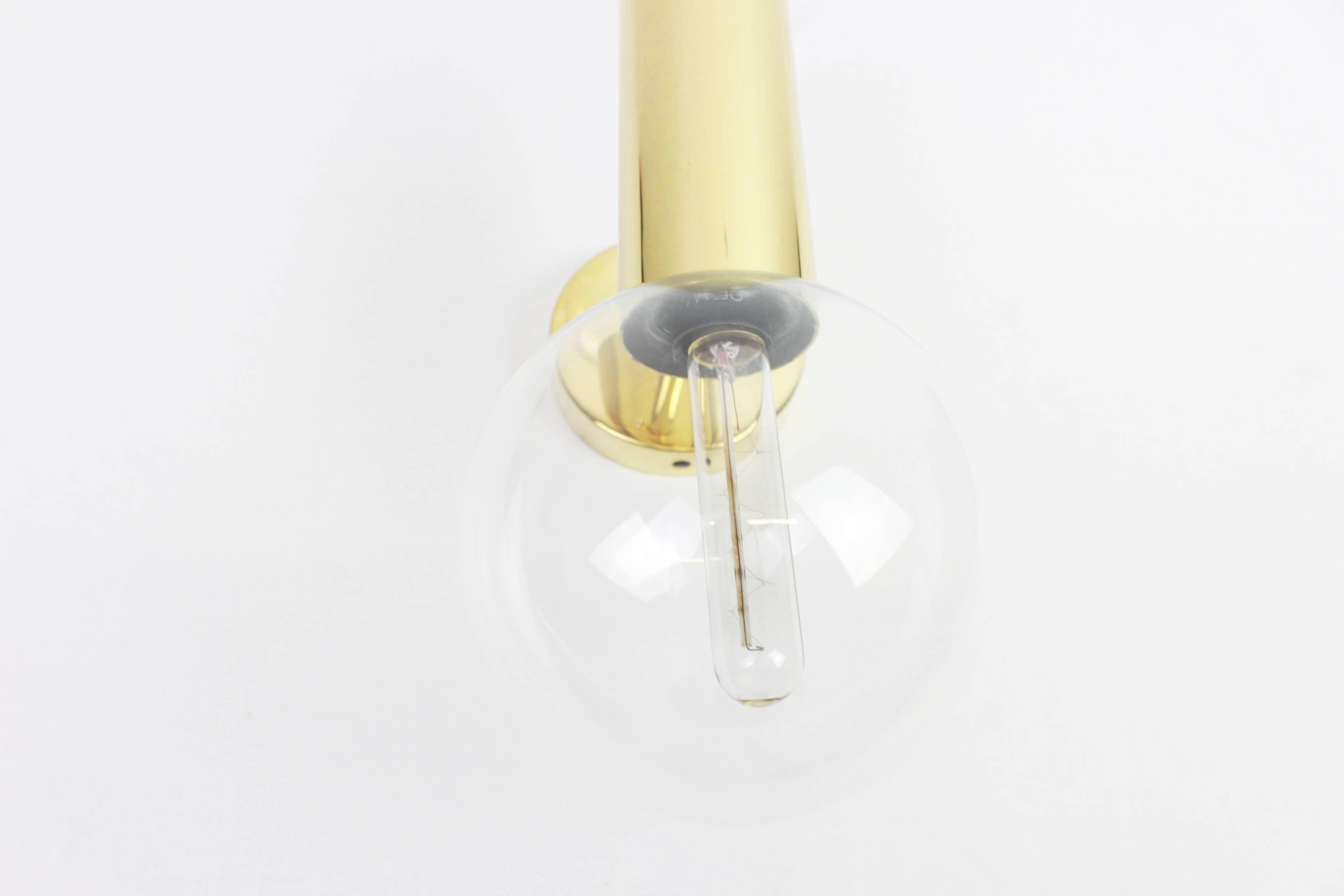 Pair of mid-century wall sconces designed by Motoko Ishii for Staff, Germany, 1970s.