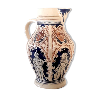 Pitcher in richly decorated German sandstone