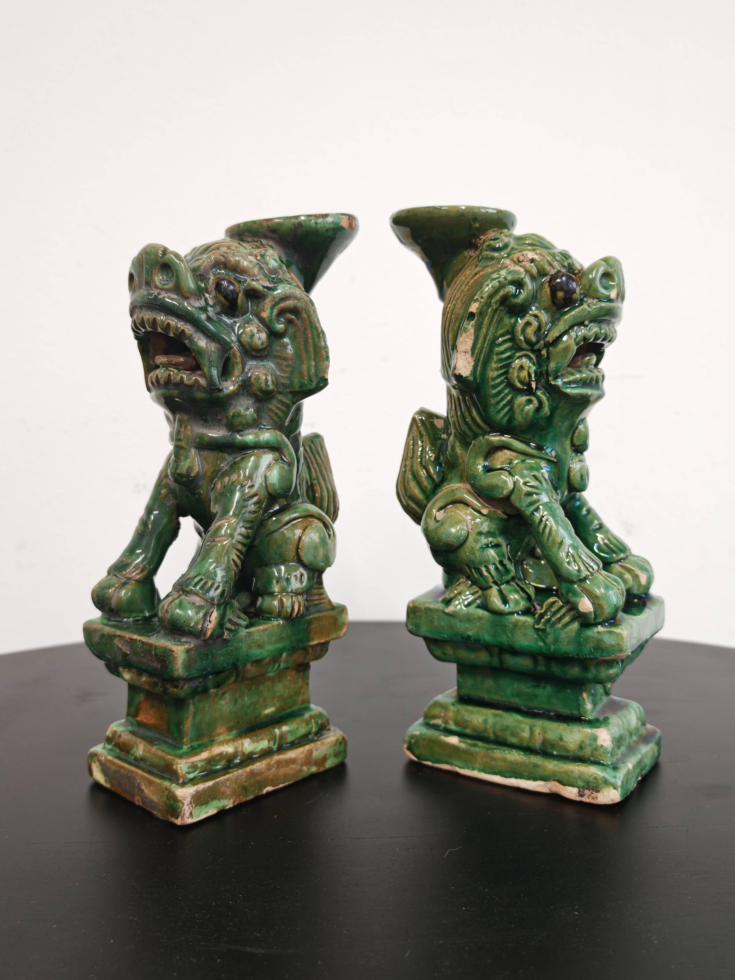 Pair of Foo Dog candle holders in ceramic, China 19th century
