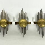 Mid-Century Set of three gilded metal sconces. Italy 1950s