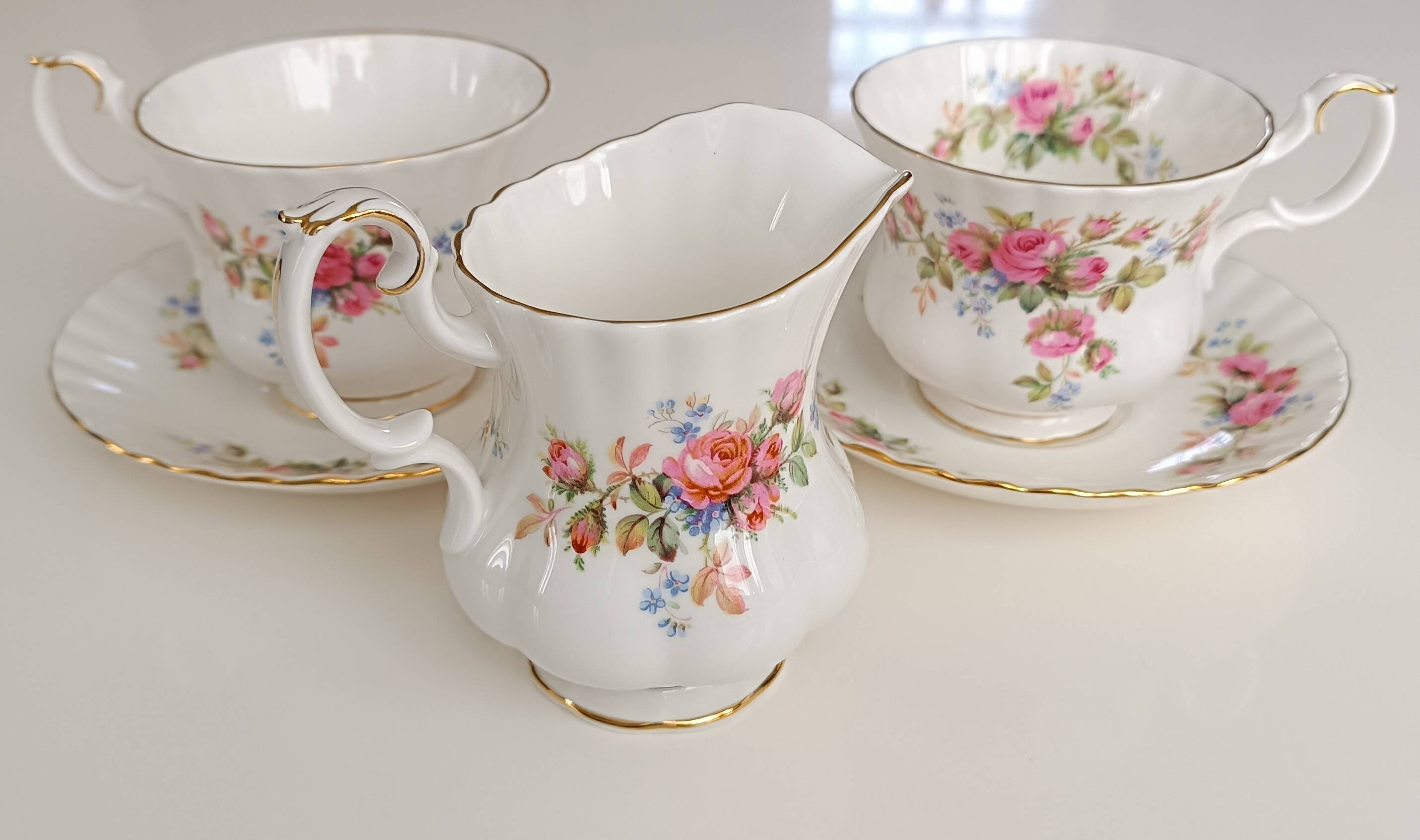 Royal Albert English porcelain set of 2 cups, saucers, and milk jug.