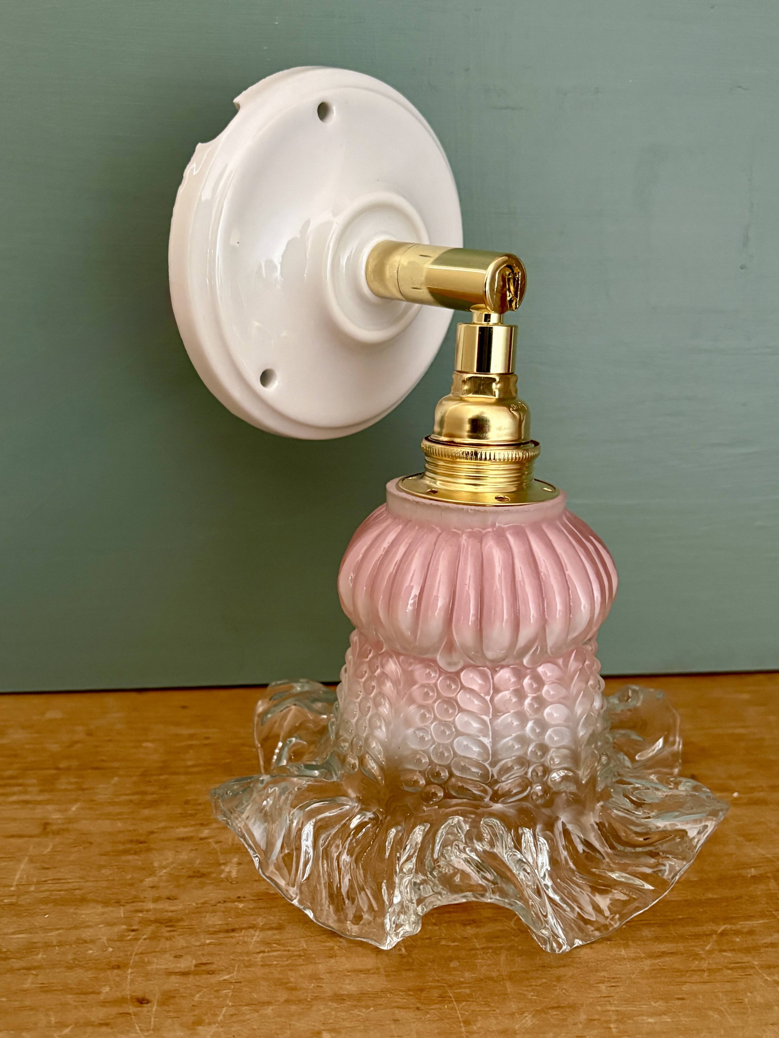Vintage pink and clear glass tulip wall light.