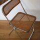 2 plia rattan chairs by piretti