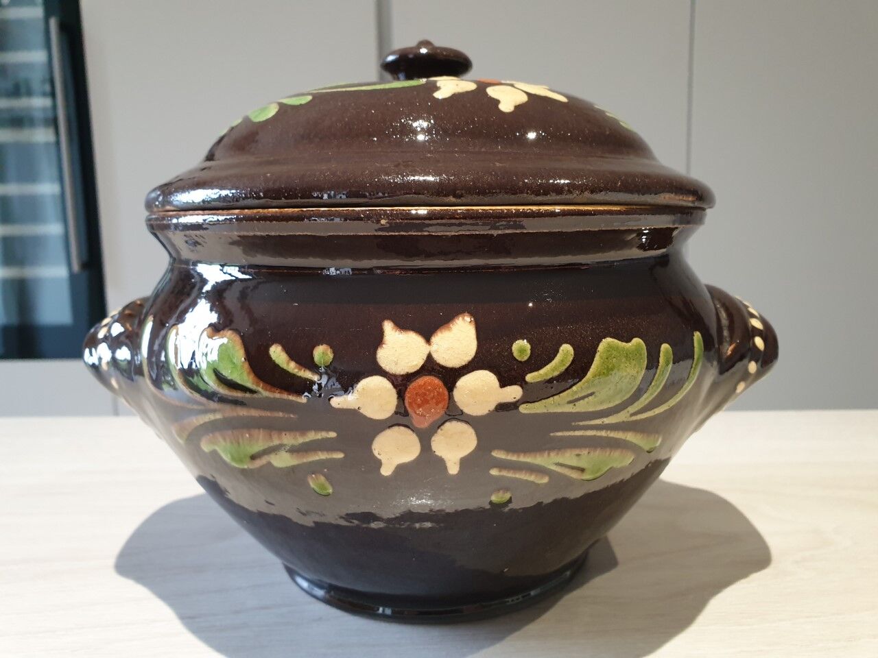 Large glazed terracotta covered pot