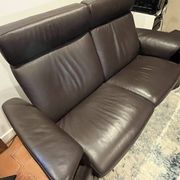 2-seater Stressless sofa with its footrest.