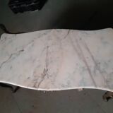 Table basse dessus marbre