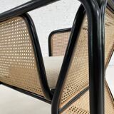 Cubic armchair in black rattan and canework
