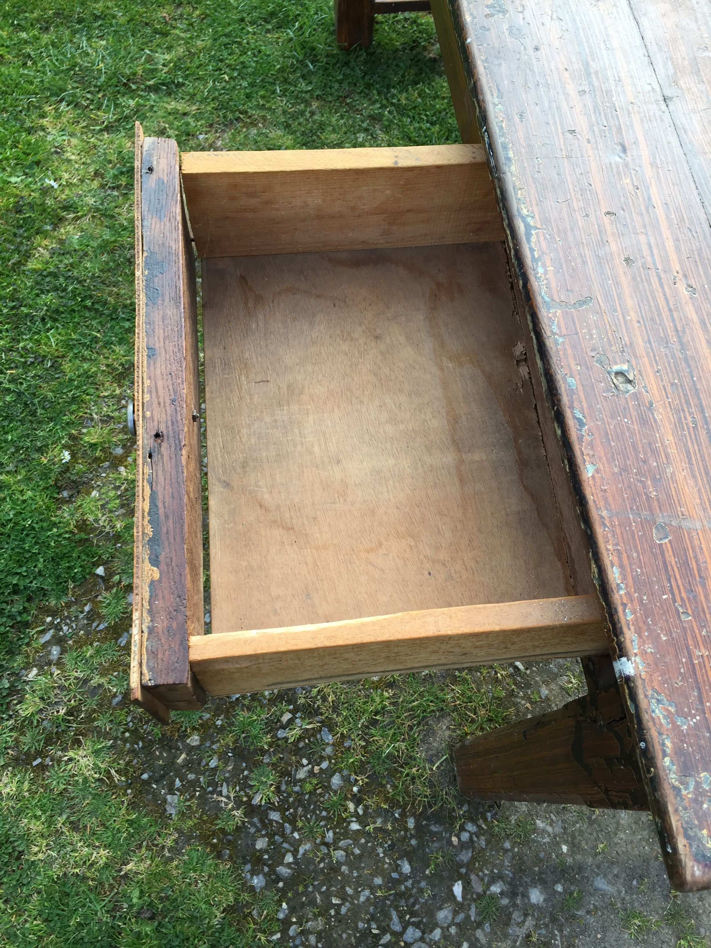 Old farmhouse table in oak painted faux wood old painting.
