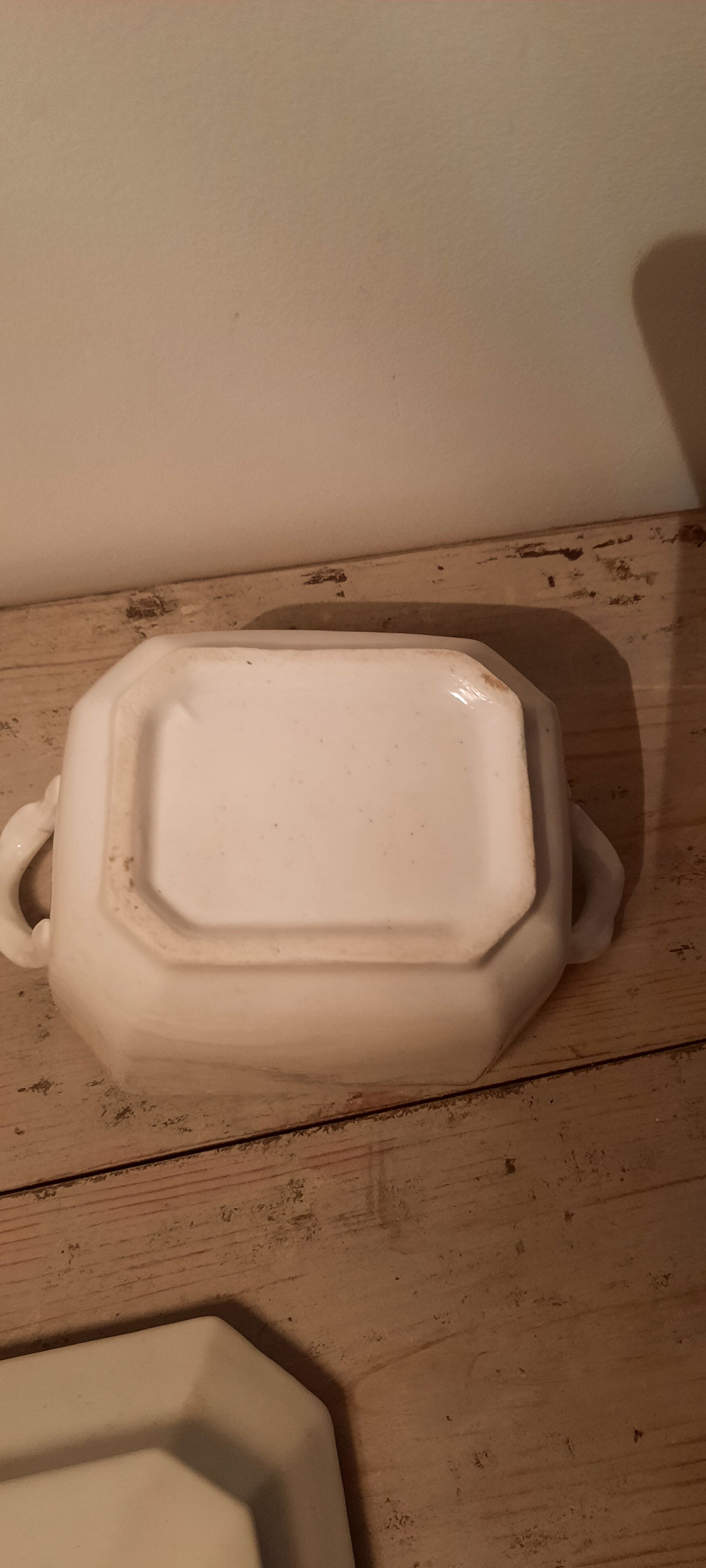 Old sugar bowl in white porcelain