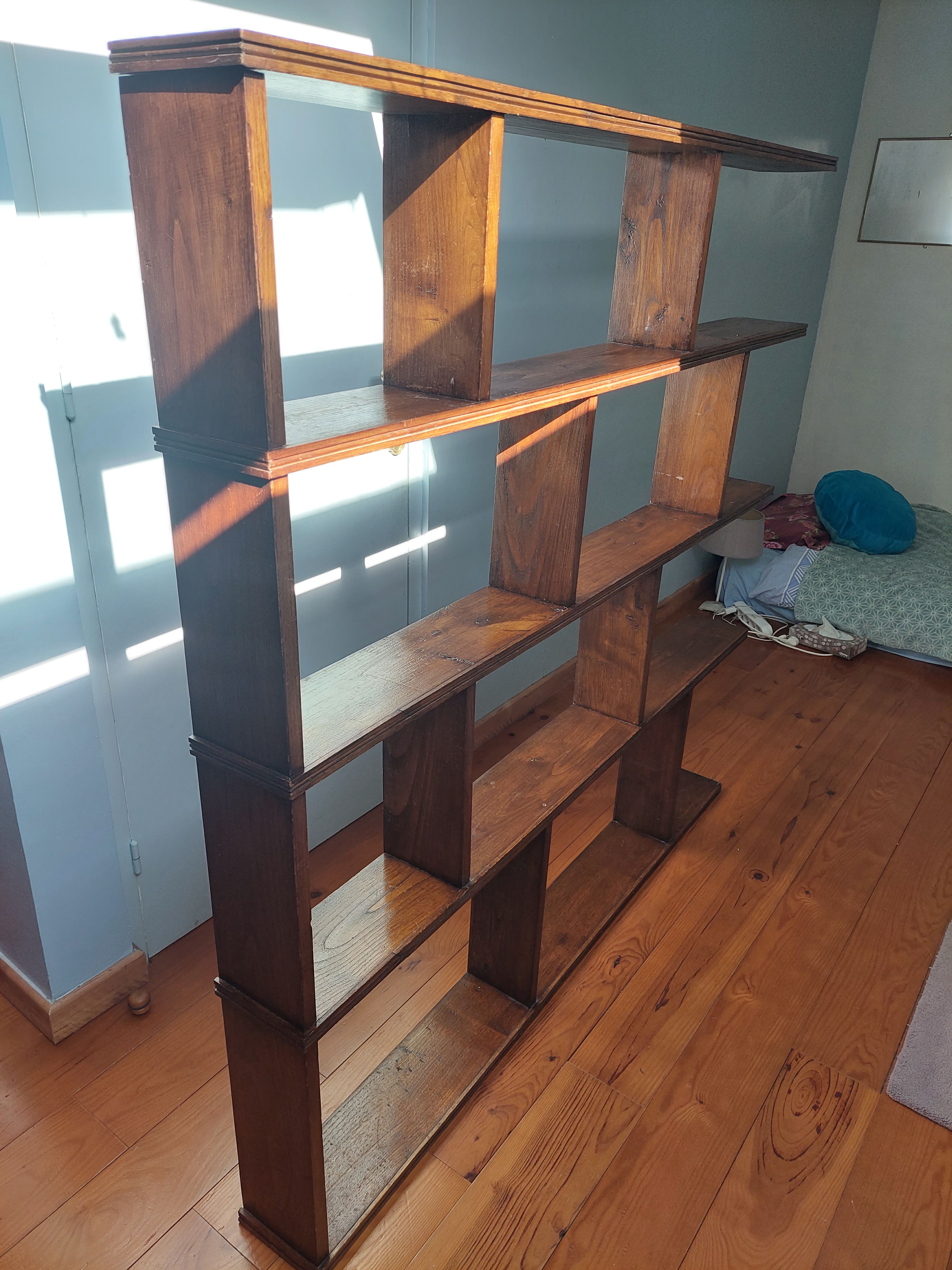 Asymmetrical wall or divider bookcase in dark wood