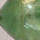 Demijohn with a beautiful glass mixing green and brown