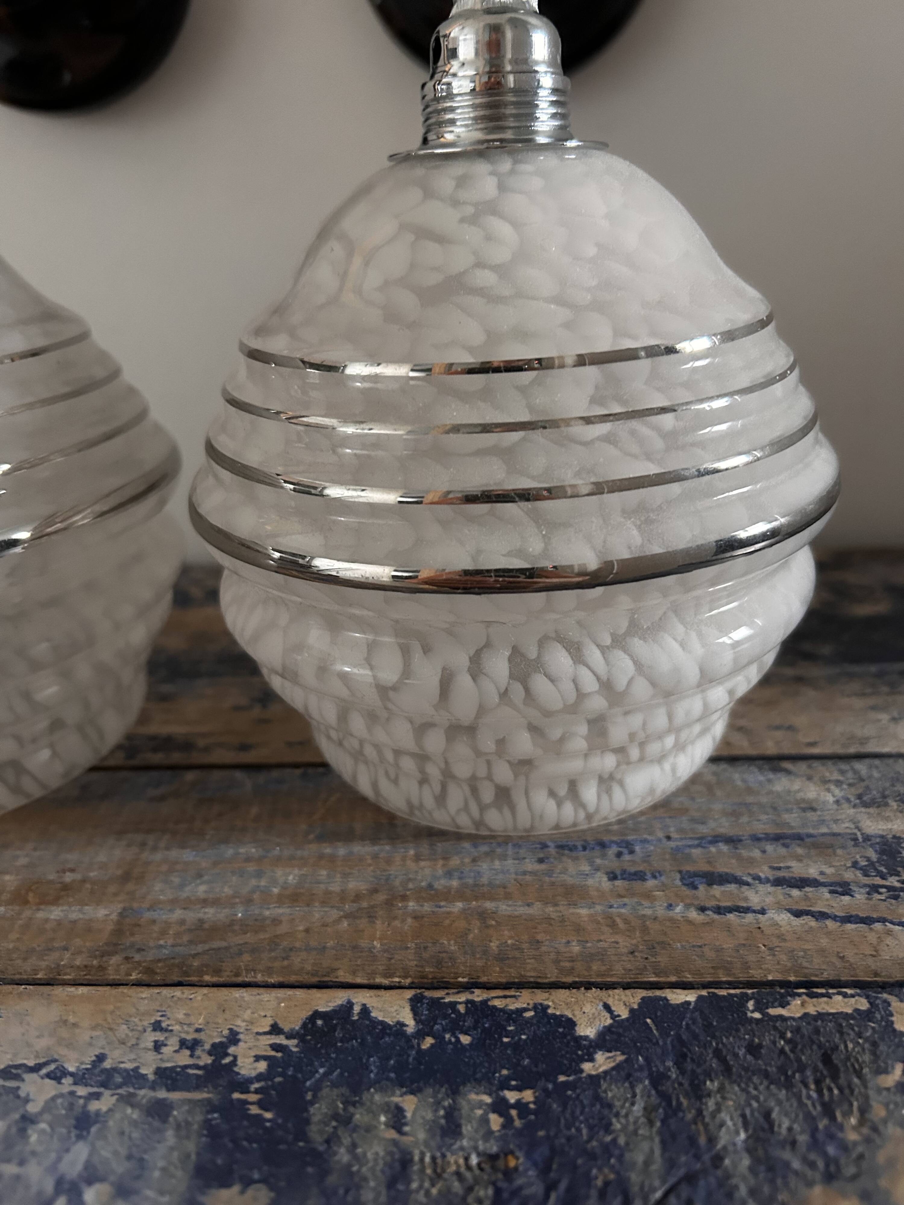 Pair of white, black and silver Art Deco wall lights