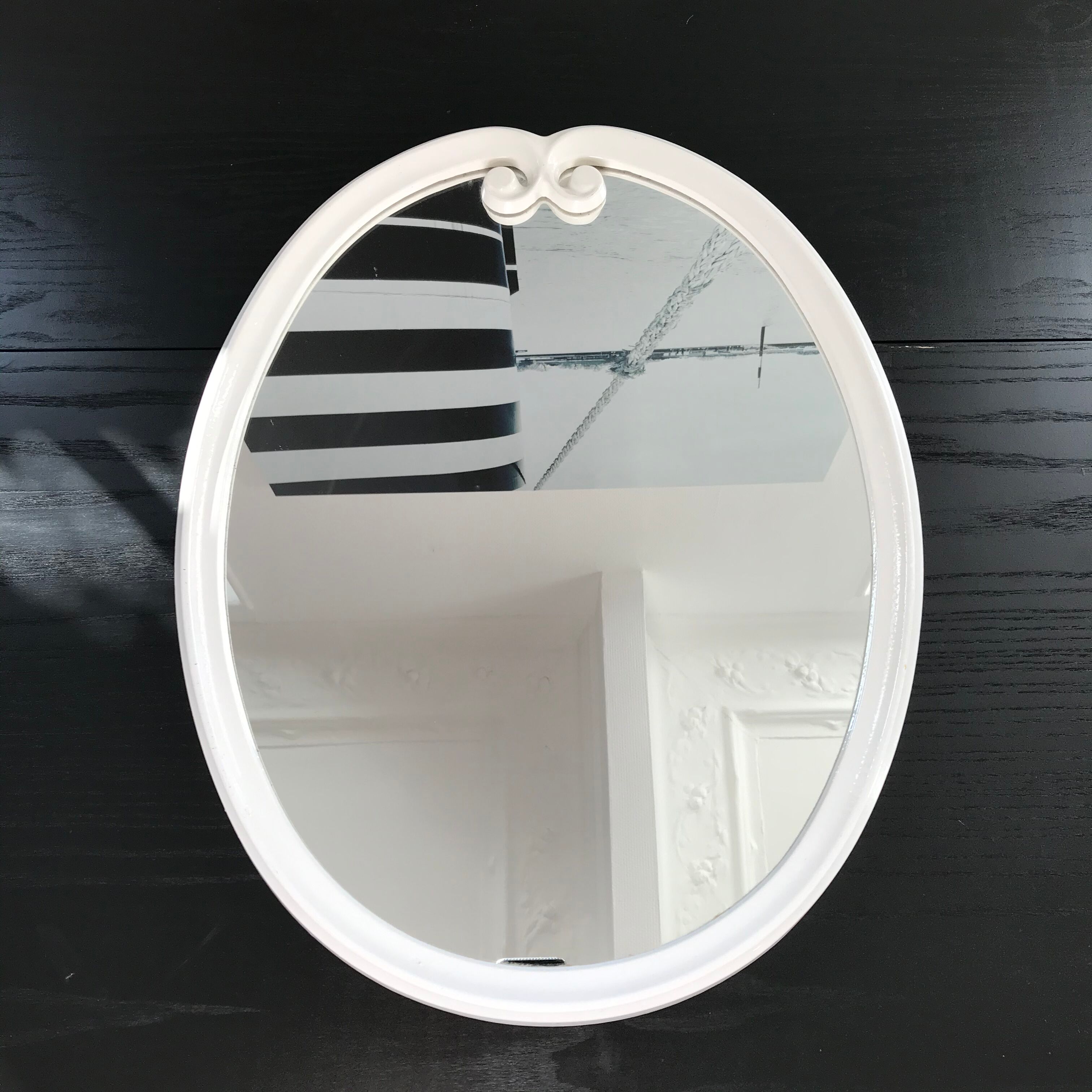 White metal oval mirror 49x39cm