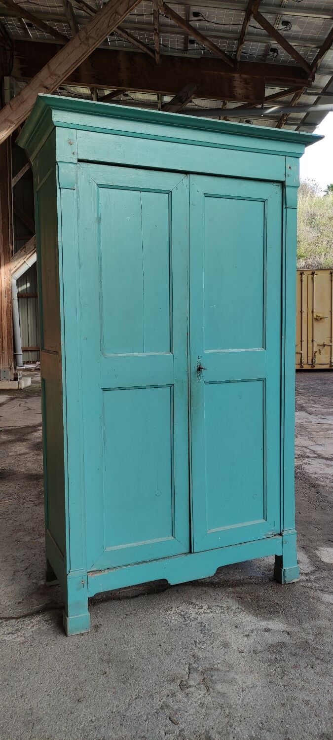 Antique patinated two-door cabinet