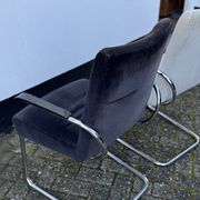 Paire de fauteuils en acier tubulaire