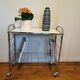 Vintage wheeled service in chrome-plated metal