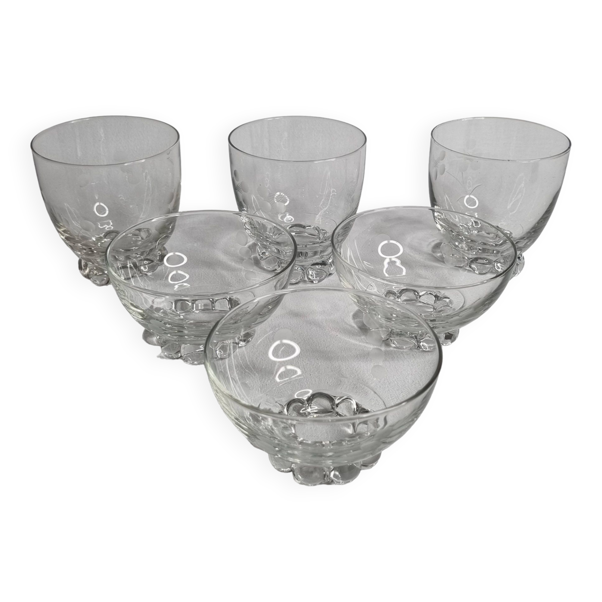 Set of Art Deco style engraved crystal bowls and glasses on spherical feet