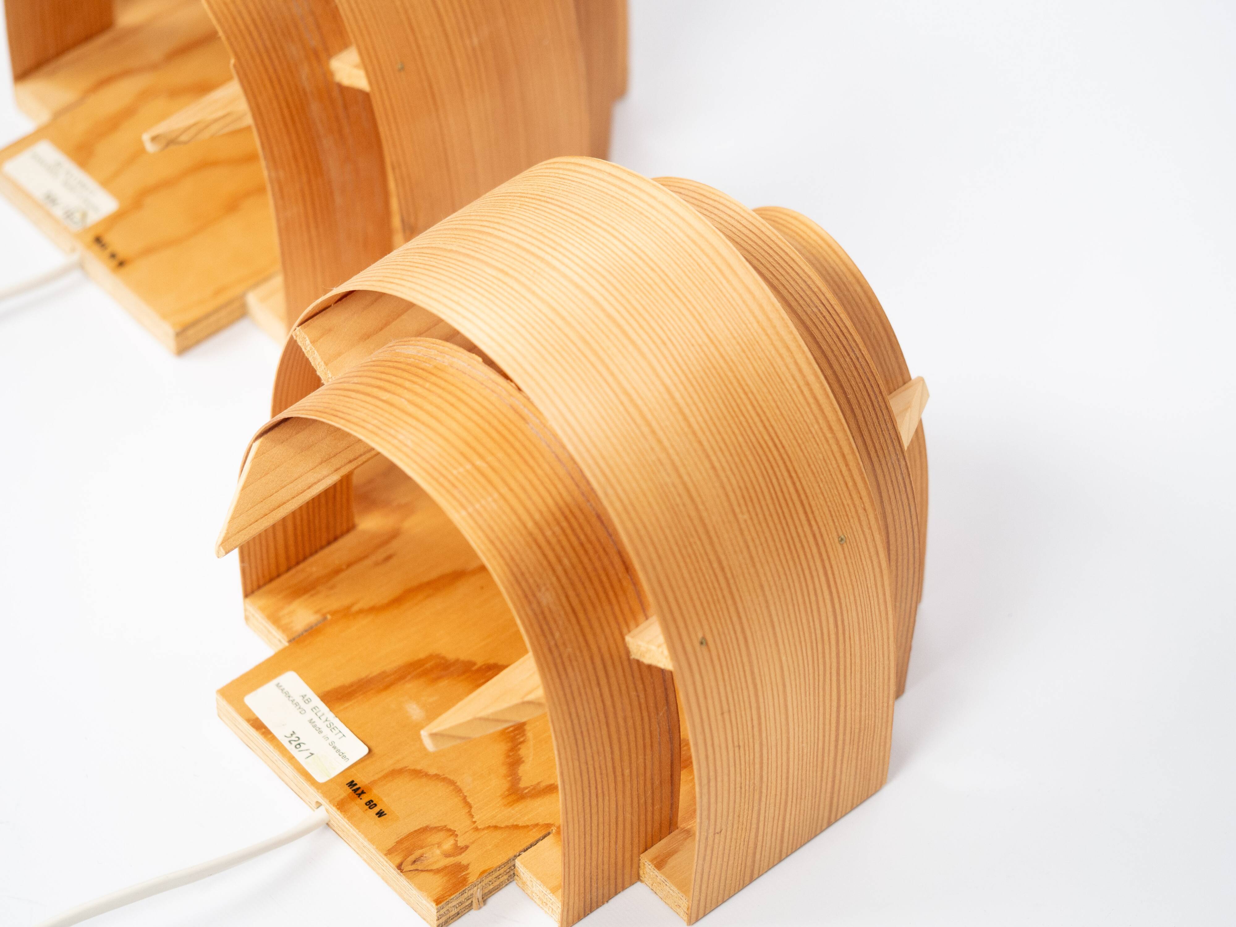 Pair of pine wood wall lamps V327 by Hans-Agne Jakobsson, AB Elysset, 1960s