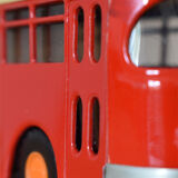 2th century painted sheet metal bus