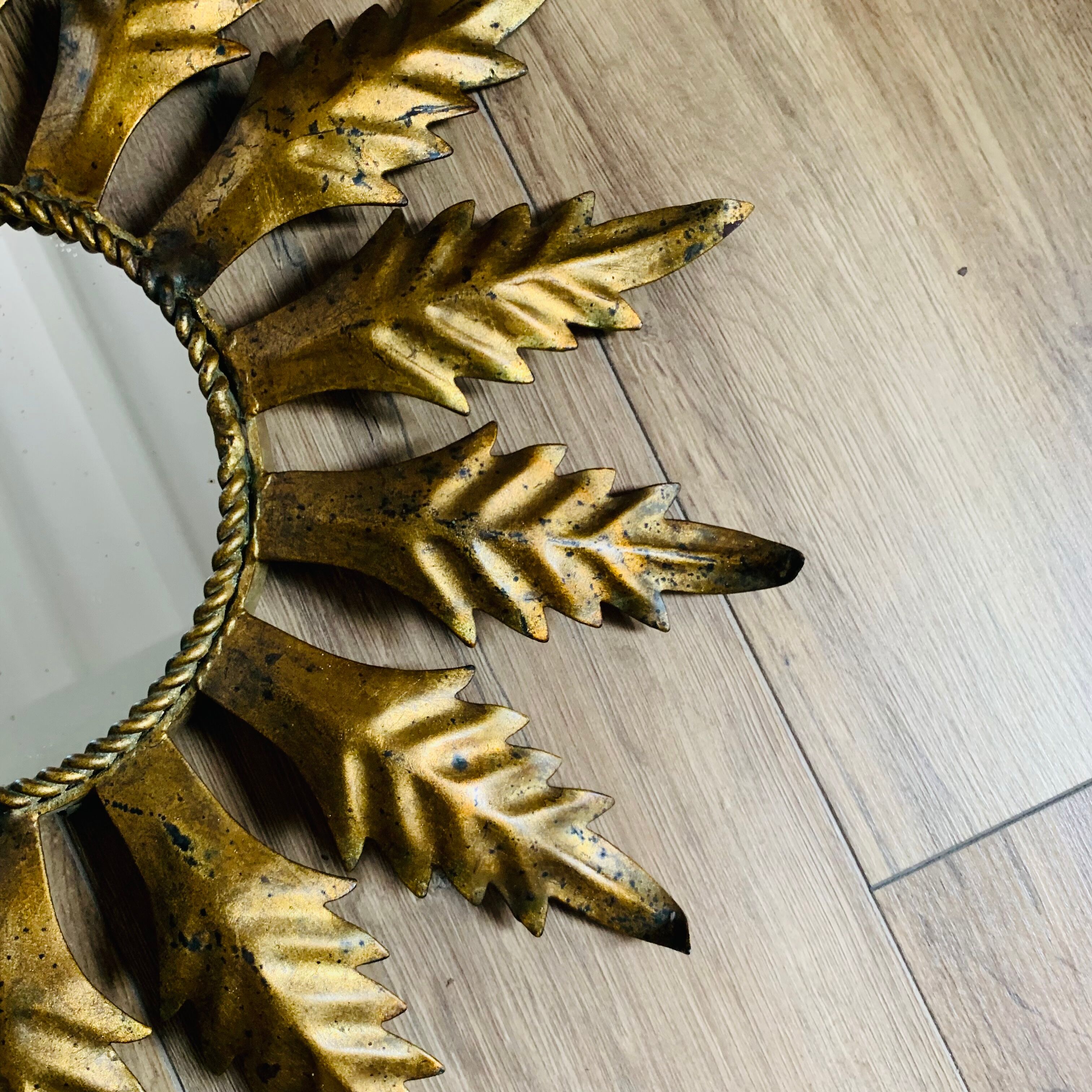 Golden metal sun mirror