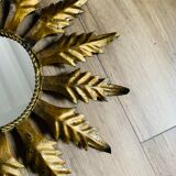 Miroir soleil métal doré