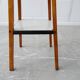Plant stand made of wood and formica with two shelves, flower column