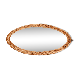 Vintage rattan oval mirror