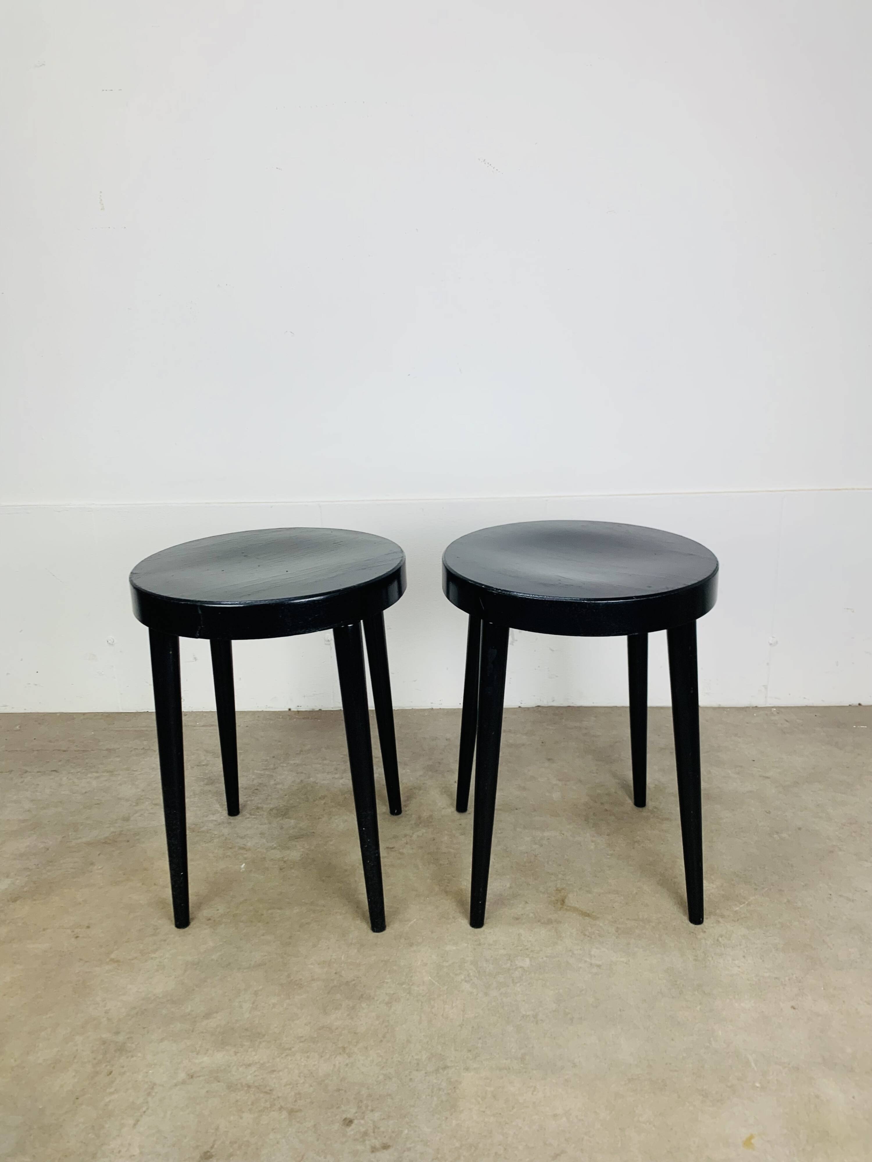 Pair of black Baumann stools, 1960s