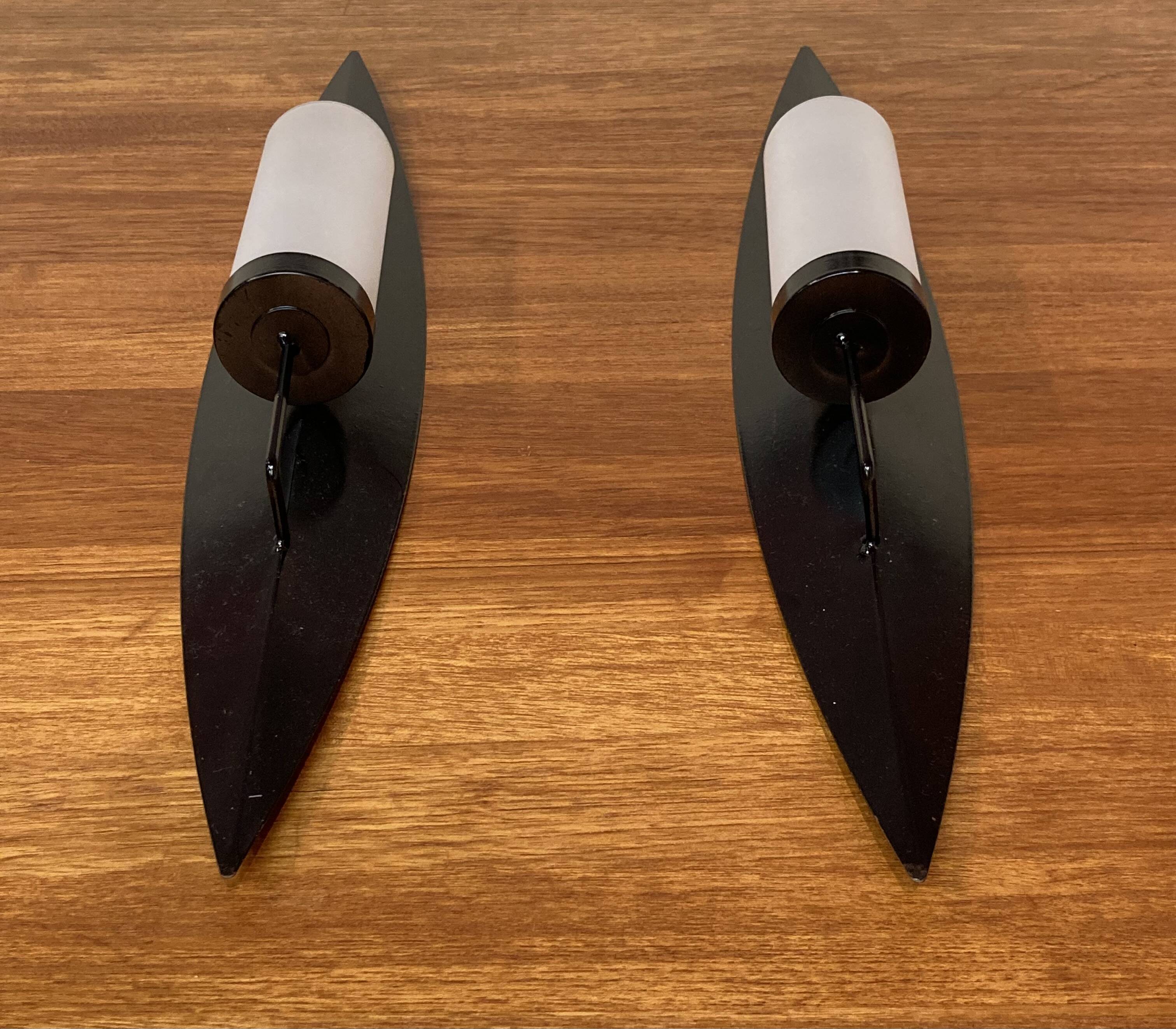 Pair of Scandinavian design candle holders in glass and metal.