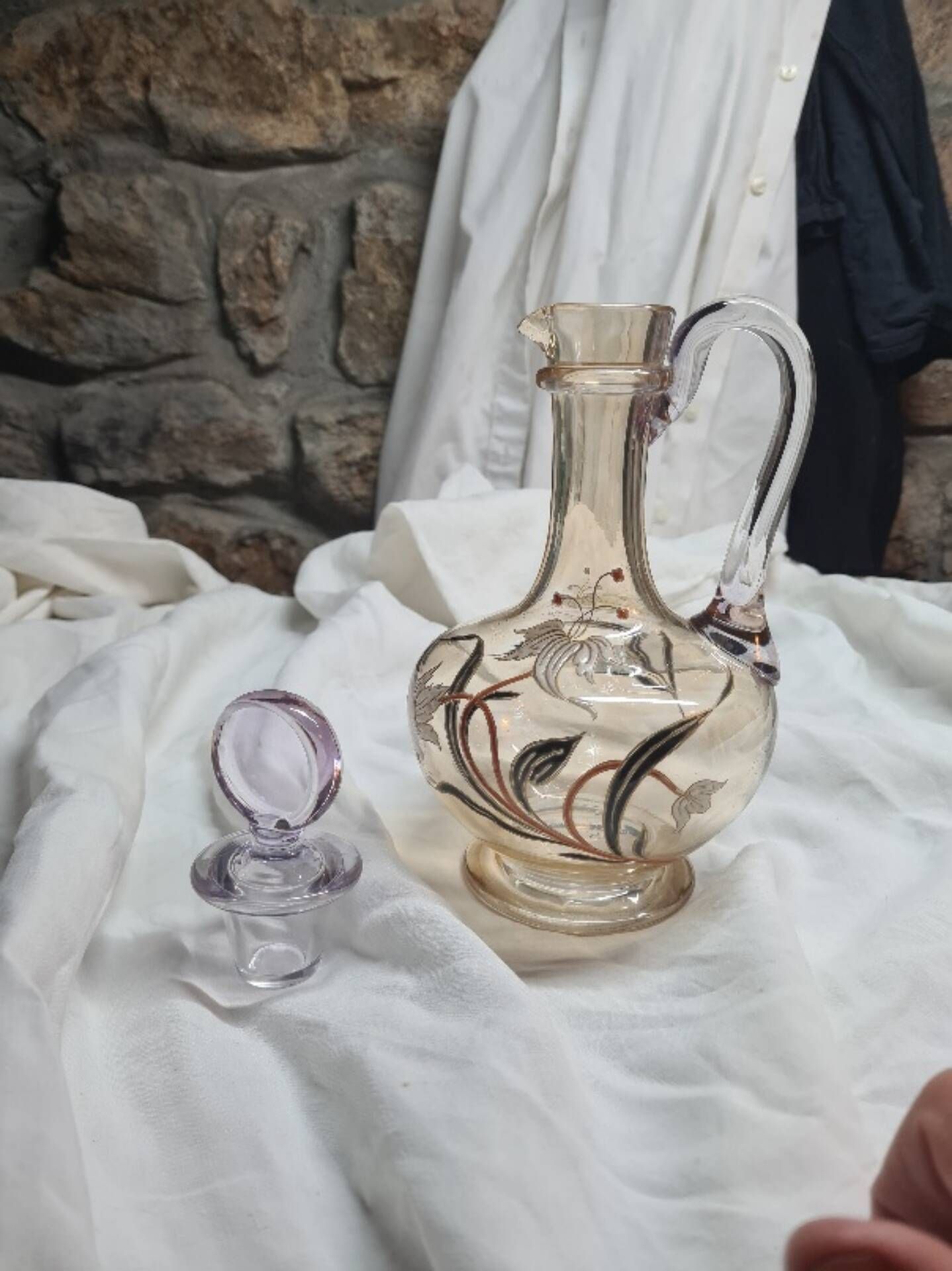 Large Art Nouveau carafe with iridescent enamelled glass and flowers.