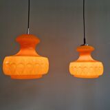 Pair of Space Age pendant lights in orange opaline, Peill & Putzler, 1970
