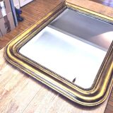 Old large Louis Phillipe mirror, gilded with gold leaf - Emilien"