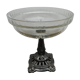 A glass cup on metal stand