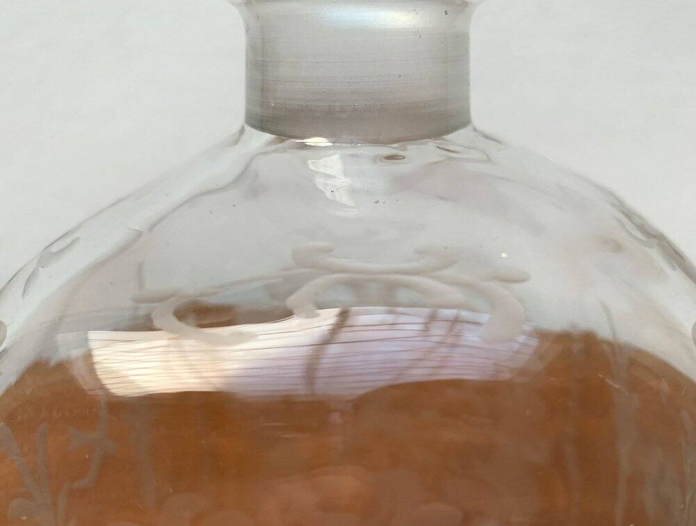 Vintage Danish glass bottle with engraving.