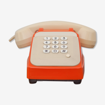 Téléphone orange et beige vintage, téléphone à touches, appareil téléphonique, rétro