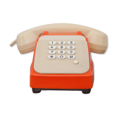 Téléphone orange et beige vintage, téléphone à touches, appareil téléphonique, rétro