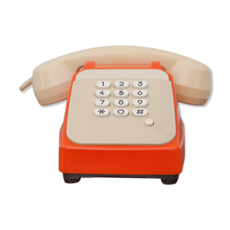 Téléphone orange et beige vintage, téléphone à touches, appareil téléphonique, rétro