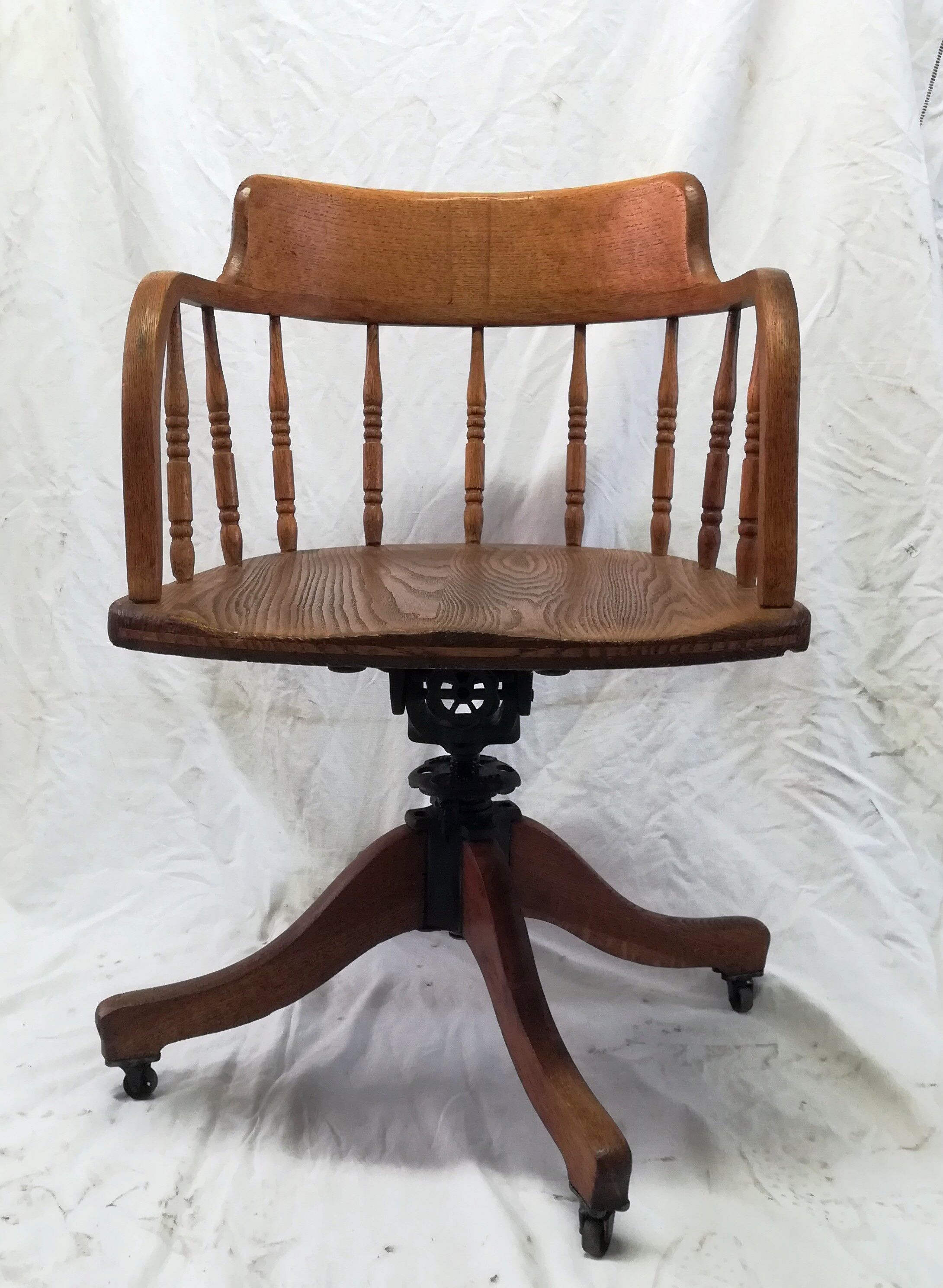 Adjustable swivel American armchair 1900