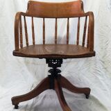 Adjustable swivel American armchair 1900