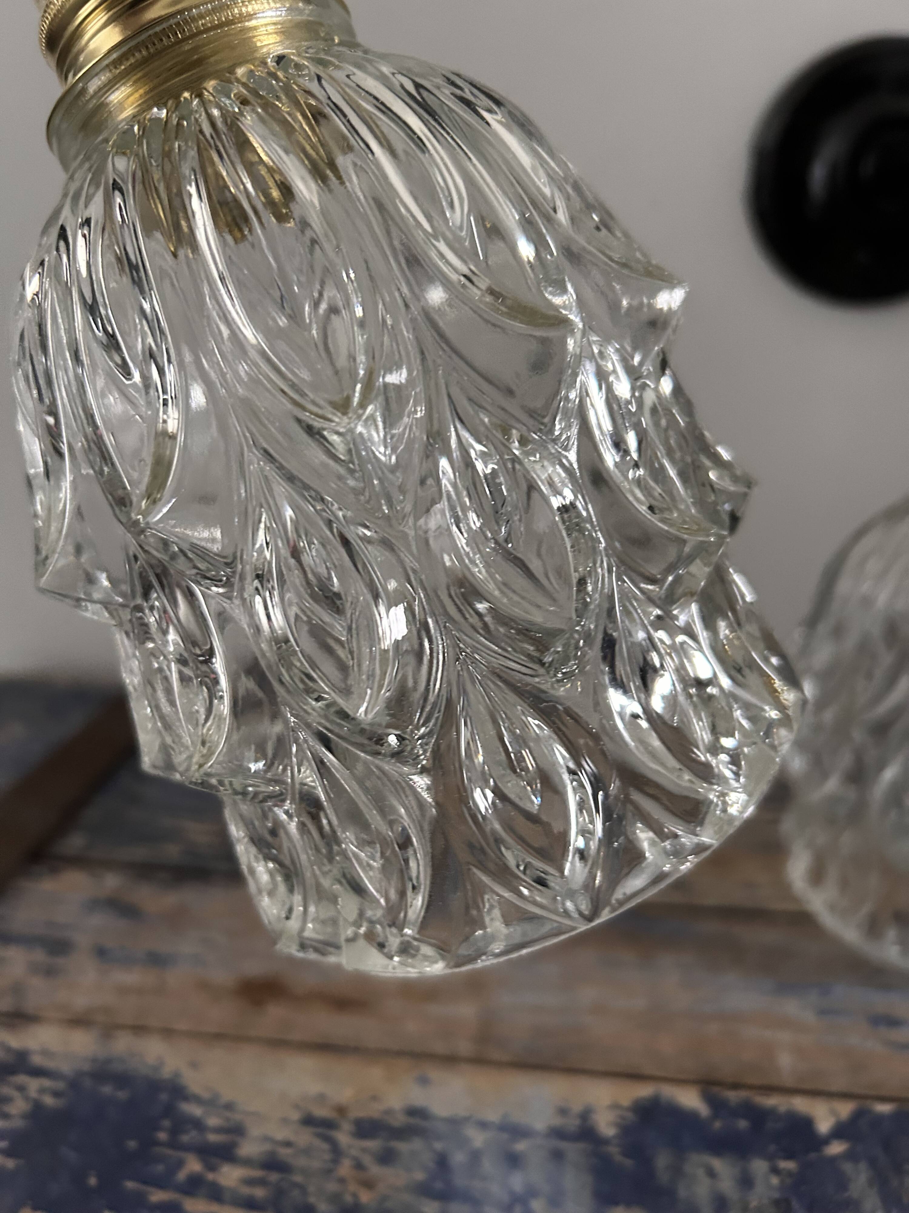 Pair of chiseled glass wall sconces
