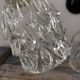 Pair of chiseled glass wall sconces