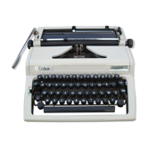Machine a écrire Erika nettoyée avec sa notice et sa valise