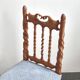 Chaise vintage en bois sculpté
