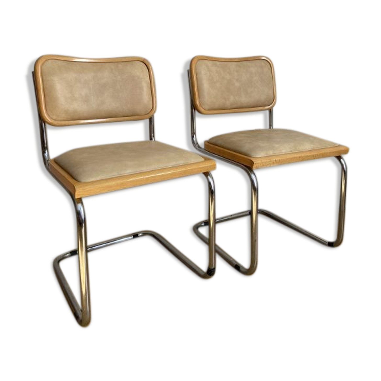 Pair of in beige skaï chairs