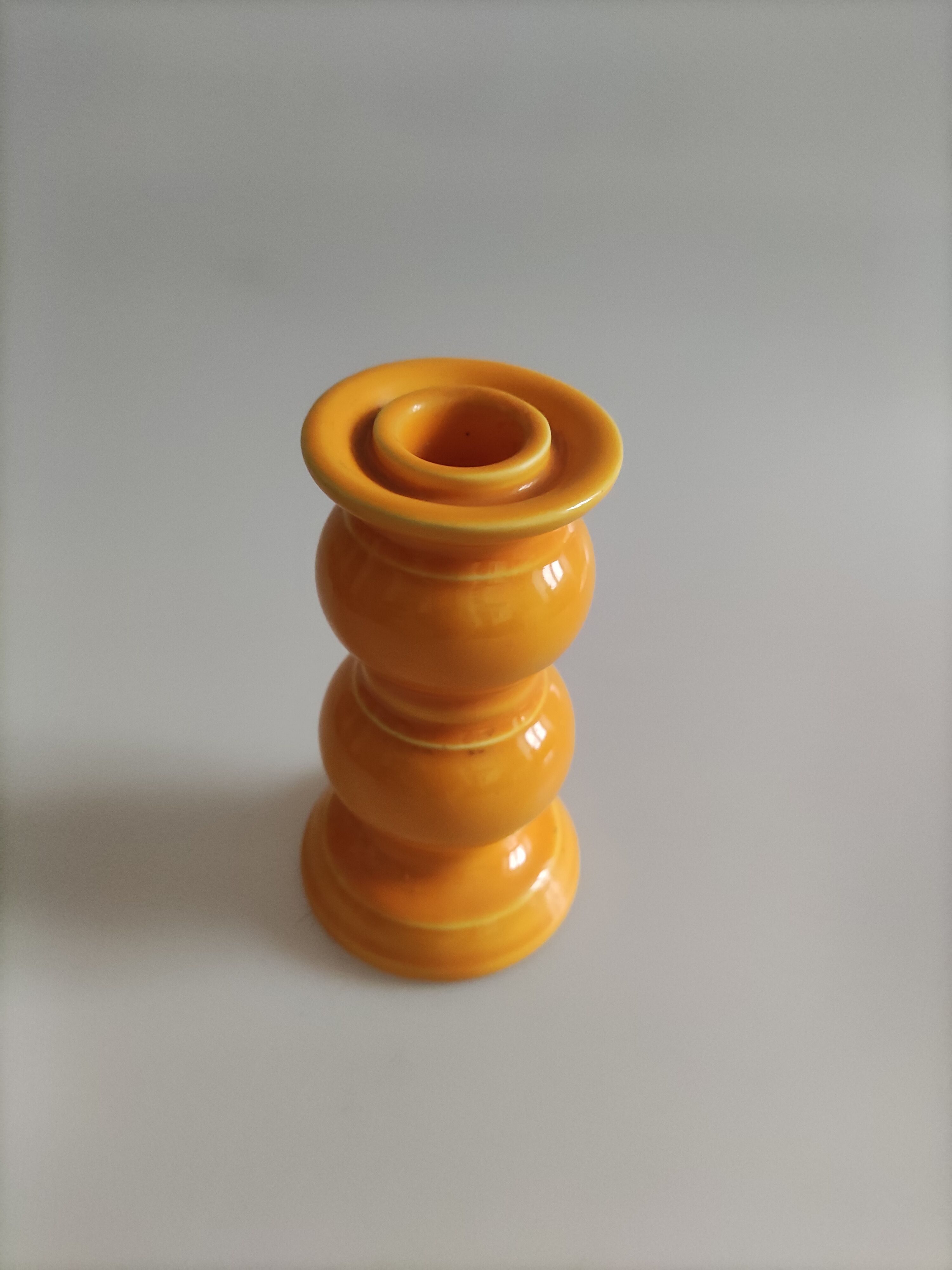 Yellow ceramic candle holder
