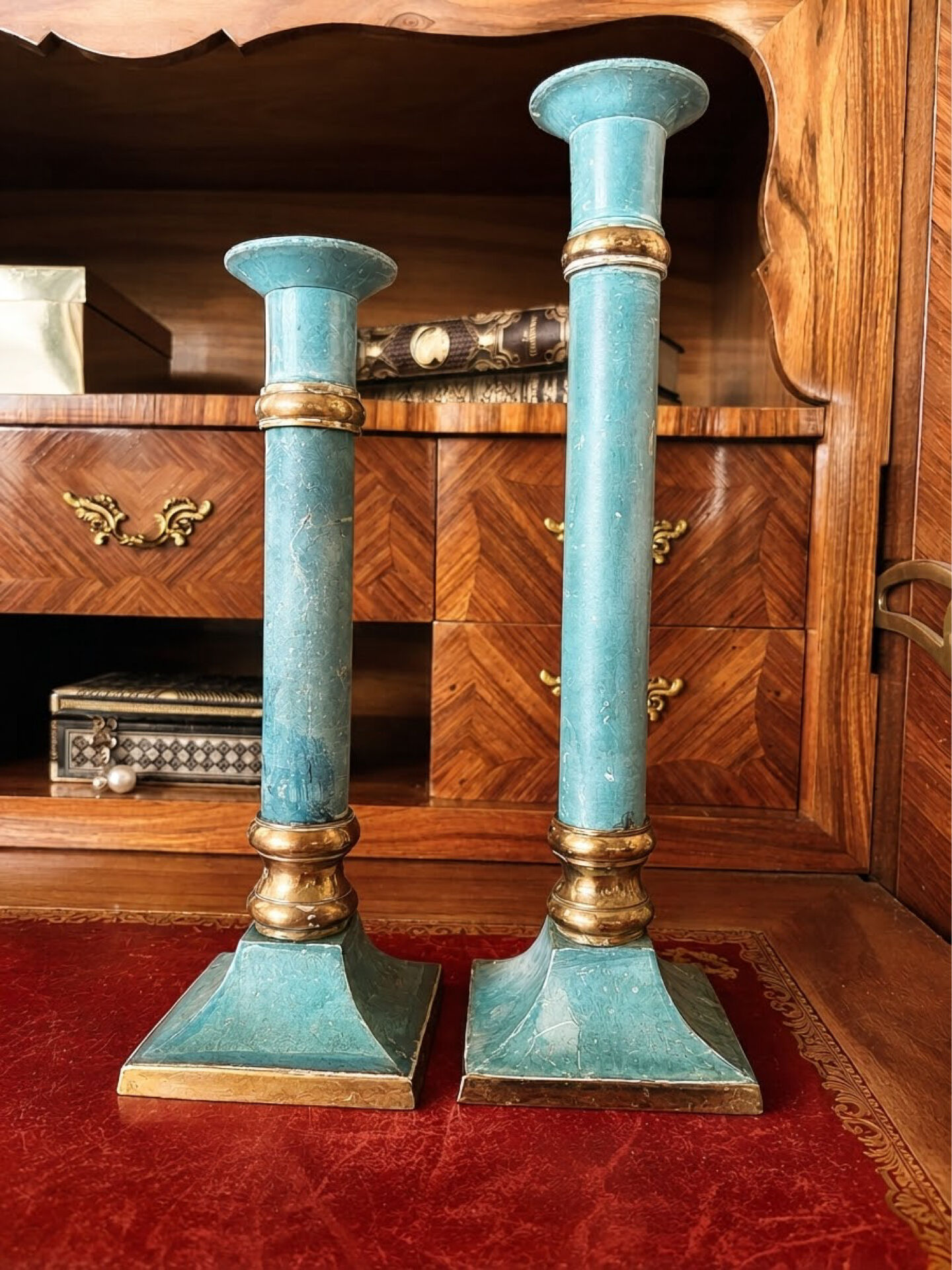 Exceptional pair of large candlesticks in patinated greenish-blue brass.