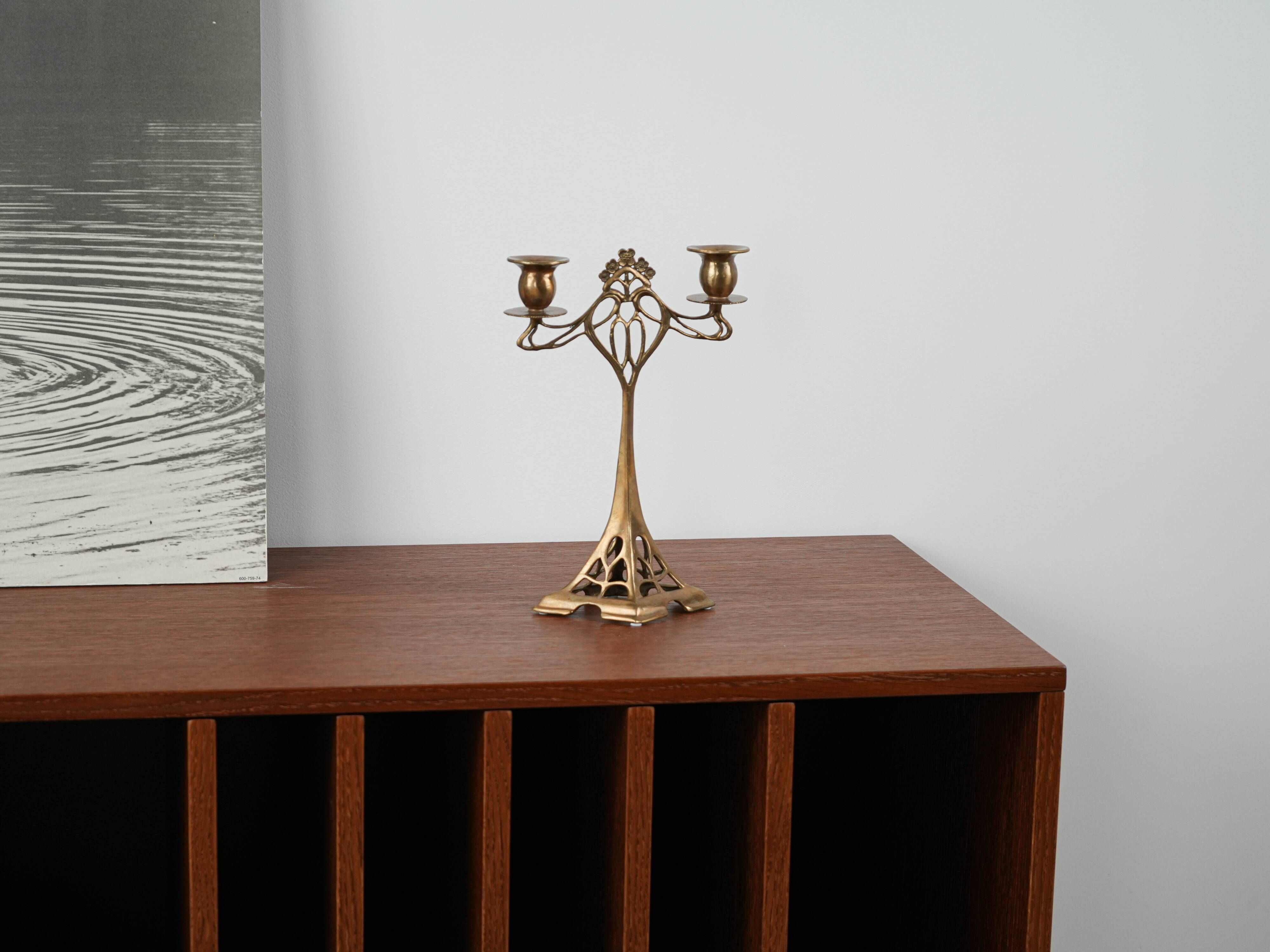 Art Nouveau brass candlestick with floral ornamentation, two arms, European