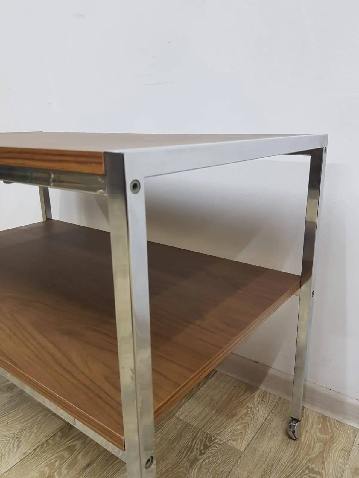 Mobile side table, brown, veneer, chrome-plated steel, Germany, 1970s.