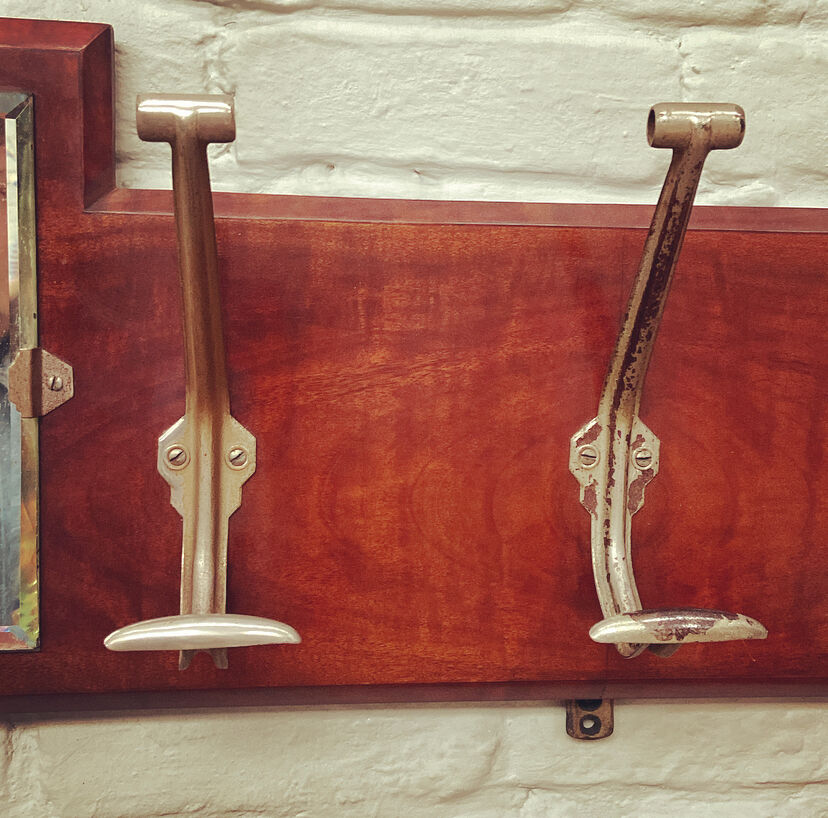 Mirror coat rack